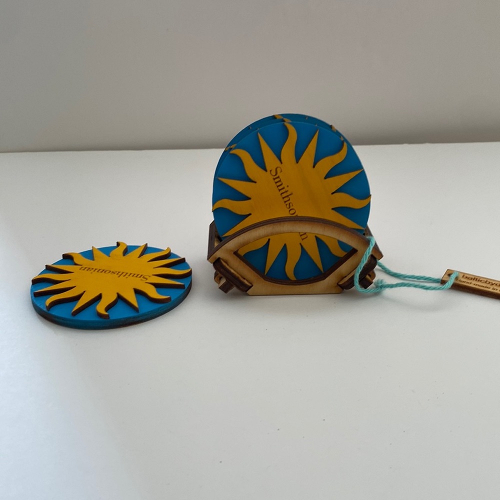 Yellow and blue Smithsonian coasters